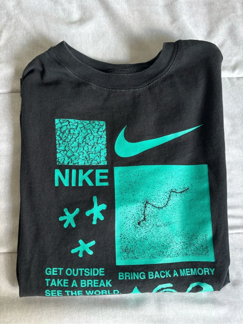 Nike Black Short Sleeve Tee with Teal Graphic
